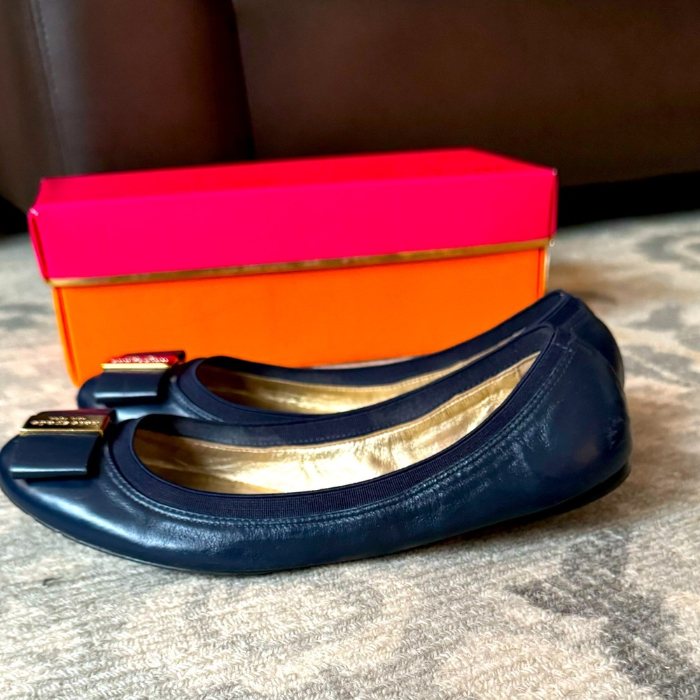 Kate Spade blue leather slip-on ballet flats.
